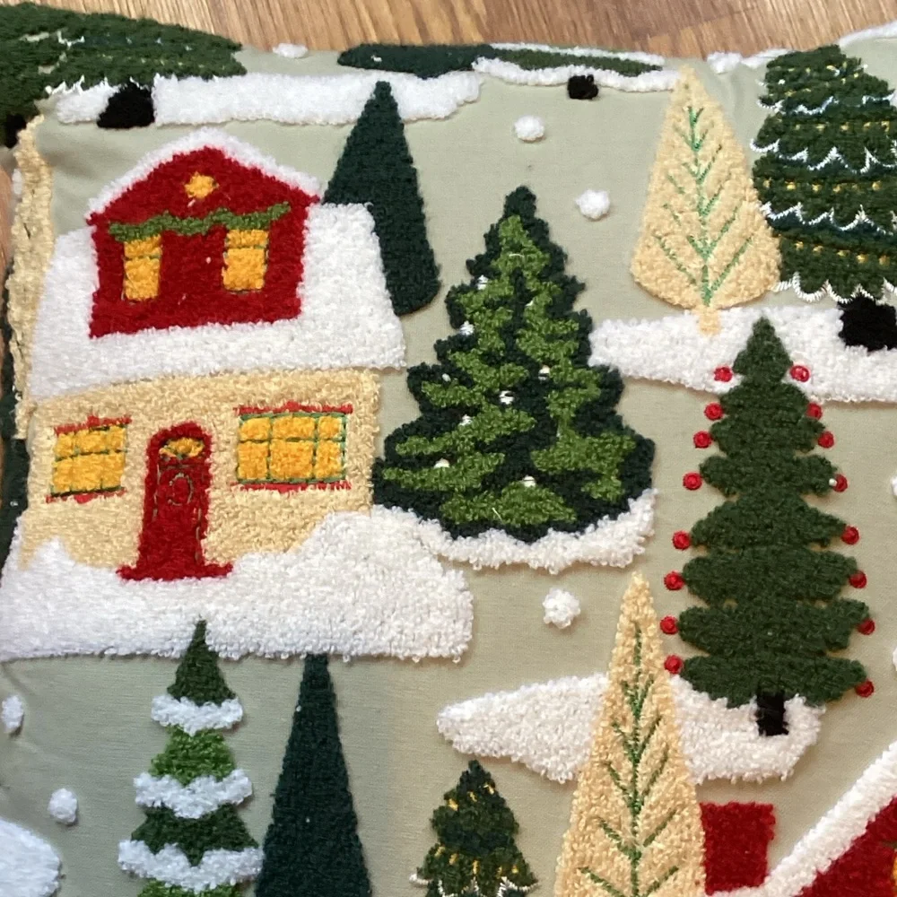 Cozy Holiday Village Pillow with Red and Green Design
